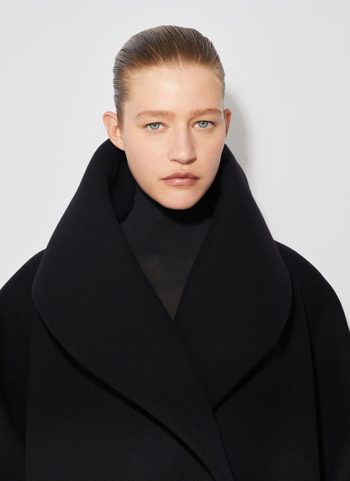 CAPPOTTO AVVOLGENTE IN LANA ALAÏA CAPPOTTO AVVOLGENTE IN LANA NERO